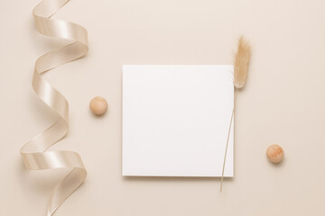 Blank paper card with lagurus grass, minimal aesthetic style. Business brand, social media, logo and invitation template. Flat lay, top view