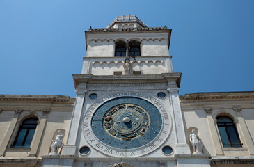 The Clock Tower with its famous astronomical clock. The Clock Tower is a building of medieval origin overlooking Piazza dei Signori in Padua, Italy.