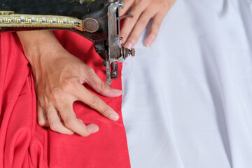 The tailor makes the Indonesian national flag ahead of independence day