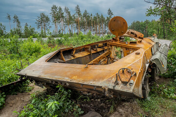 Rusty hull of a wrecked tank.Broken russian tank, Military crisis, military intervention in...