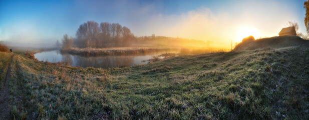Fog over the river in the early morning on an autumn day. Nature of Ukraine