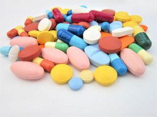 colorful pills on white background