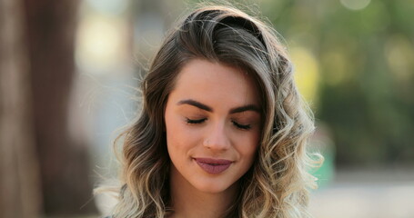 Fototapeta premium Portrait of young woman with eyes closed
