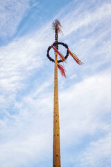 Tall maypole in the summer