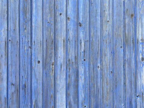 A Light Blue Painted Washed Out Plank Wall