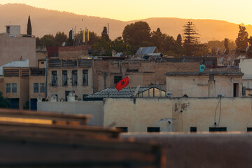 Moroccan flag on the roof of a house in the Medina