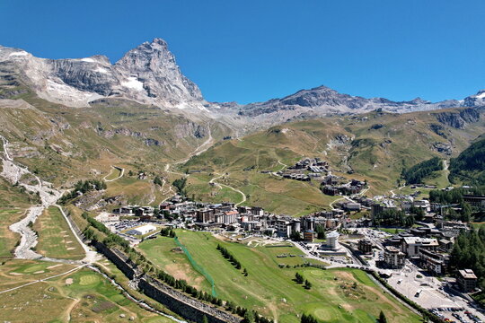 Panoramic view from above the village of Breuil-Cervinia with the Matterhorn in the background. Breuil-Cervinia, Italy - August 2022