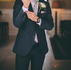 Stylish groom wears dark blue suite - 521039725