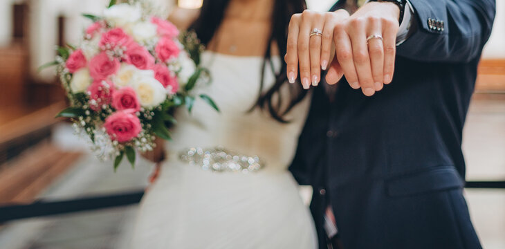 a bride from Latin America and caucasian groom, bridal couple in love, happy wedding day