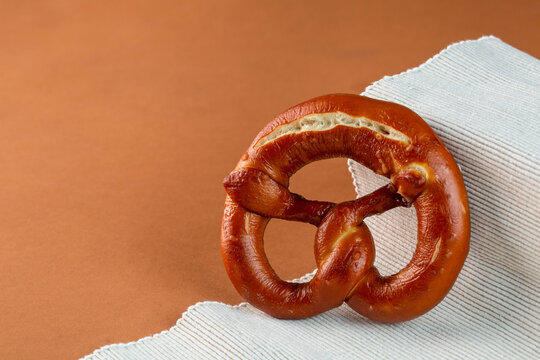 Fresh pretzel served on cloth