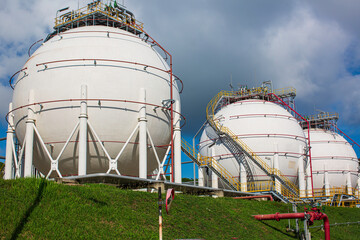 White spherical propane tanks containing fuel gas industry