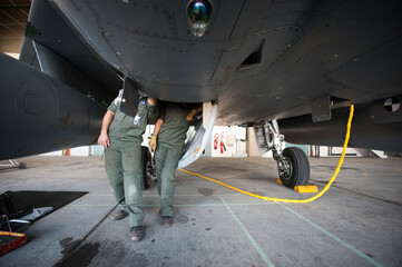 AIR BASE 118 MONT-DE-MARSAN IN FRANCE. September 15, 2011. Mechanics work on a Rafale fighter jet at Air Force Base 118 - Colonel Rozanoff. Mont-de-Marsan, Landes department, France.