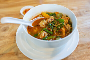 Forest curry or jungle curry in a bowl isolated on white, Spicy Thai curry from the forested areas of Thailand. a kind of Thai curry 'Kang-Paa-Kai'.