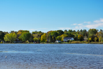 Fototapeta premium Autumn landscape with lake