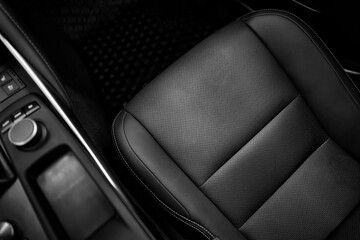 Top view of luxury sport car front passenger leather seat with detail high end fabric and stitch...