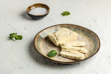Sliced halloumi cheese with mint. Cyprus squeaky cheese. banner, menu, recipe place for text, top...