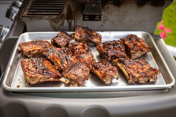 ribs cooking on the grill