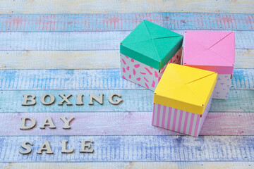 Three gift boxes on shabby background.