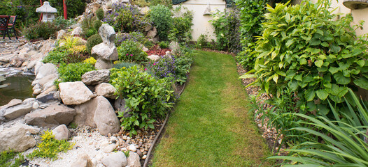 Obraz premium Beautiful ornamental garden in summer