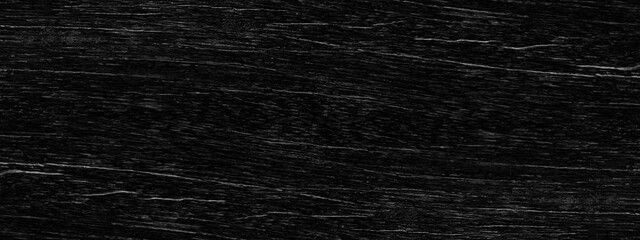 Luxury and grainy old creative black grunge texture, dark faded marbled stone or rock textured, old black board texture background with scratches. 
