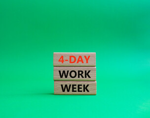 4-day work week symbol. Concept words 4-day work week on wooden blocks. Beautiful green background. Business and 4-day work week concept. Copy space