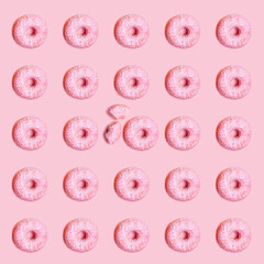 Pattern seamless of pink donut with pink background