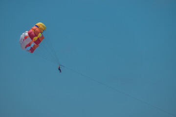 paragliding in the blue sky