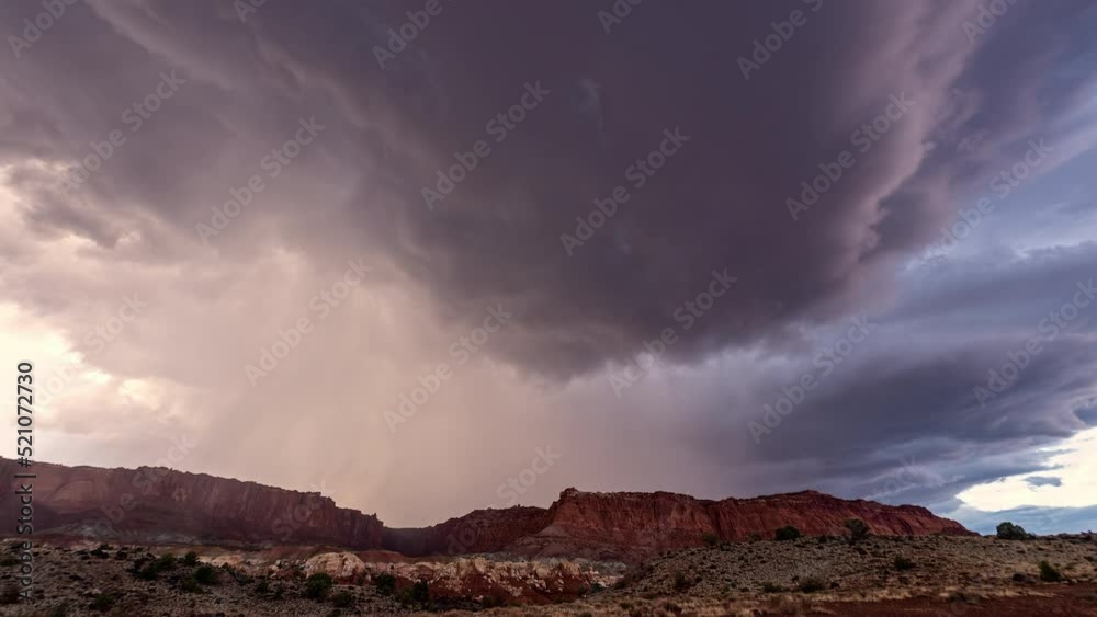 Canvas Prints monsoon storm moving through the utah desert in timelapse over the cliffs at capitol reef.