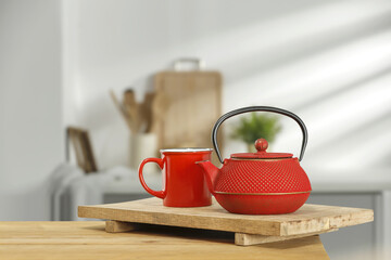 Desk of free space and kettle in kitchen 