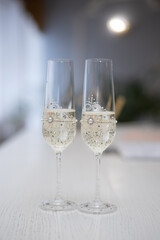 wedding glasses with champagne wine in the registry office at the ceremony