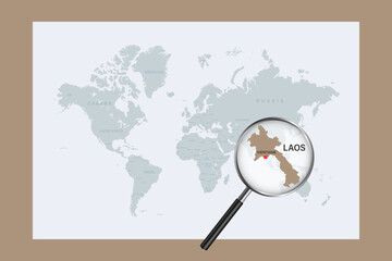 Map of Laos on political world map with magnifying glass