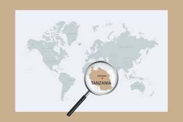 Map of Tanzania on political world map with magnifying glass