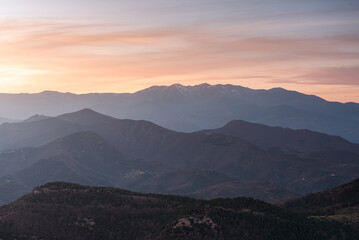 Naklejka na ściany i meble Sunset in the beautiful mountains.