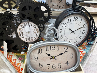 a display with a group of vintage watches, concept of time passing by, antique watches imitation