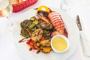 Grilled vegetables and squid, calamari served in Greek tavern, traditional greece food