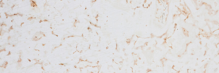 Dolomite texture. Natural rock with beautiful beige patterns on the surface. Polished flat stone. Classic luxury decoration building material. Wide panoramic texture for background and design.