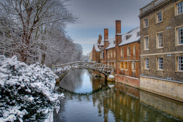 Bridge of Sighs with snow capped buildings at the University of Cambridge, England