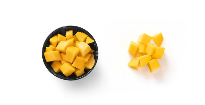 Mango In Black Plate And Diced Mango On White Background Top View Isolated