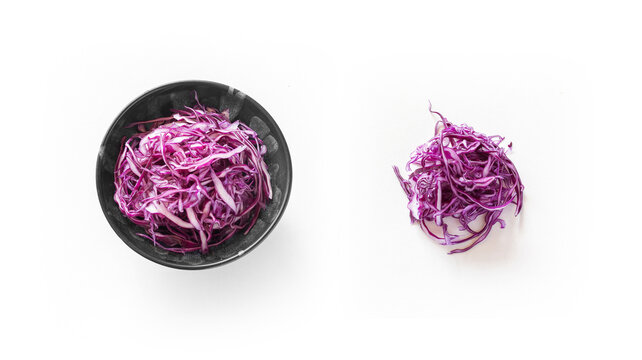 Pile of shredded purple cabbage isolated on white background
