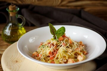 Pasta with cheese and seafood. Italian cuisine.