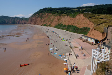 Sidmouht beach looking west, towards Peak Hill, also known as High Peak, East Devon, UK