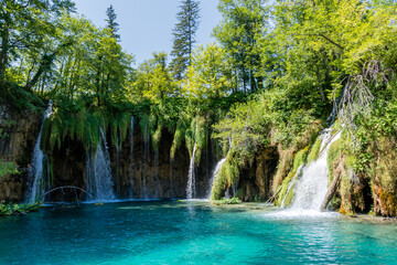 Fototapeta na wymiar Plitvice lakes in Croatia, beautiful summer landscape with waterfalls