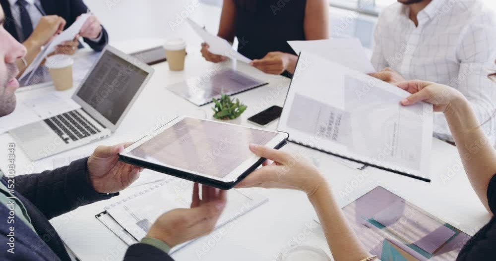 Aufkleber creative marketing team brainstorming together with a tablet around the boardroom table during a mee