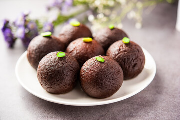 Indian Sweet Food Sweet Black Gulab Jamun Also Known as Kala Jamun, Black Jamun or Dry Kala Jam