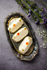 Malai Chop or Cream sandwich made using filling Rasgulla or Gulab jamun sweet is a Bengali sweet