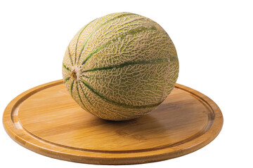 Close up view of Cantaloupe melon on wooden cutting board isolated.