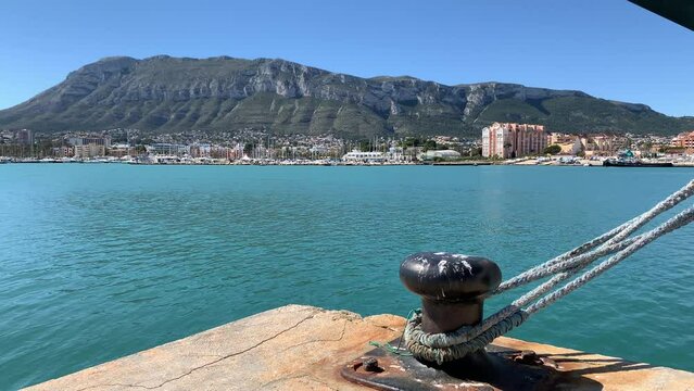 (Slow-Motion) Views of the population of Denia and Mount Montgo from the Port (Alicante, Spain)