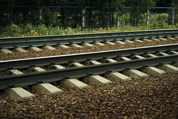 Railway rails. Cargo transportation. Line for trains. Railway track. Sleepers for the railway.