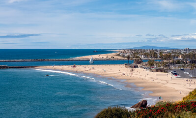 beautiful Newport Beach California coastline view from Corona Del Mar beach on a sunny summer day