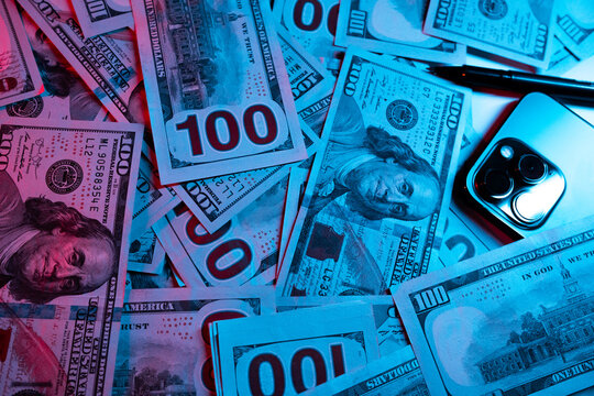 Premium Photo  Money clip with dollar bills on blue panorama background